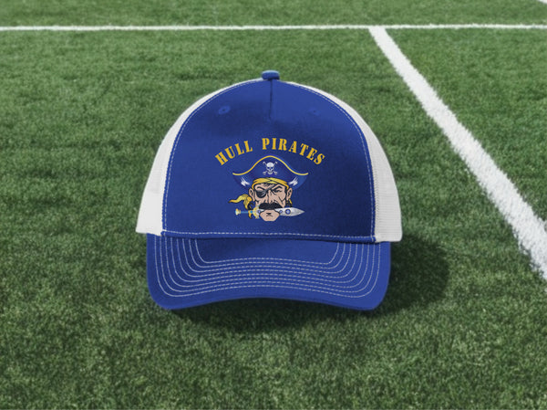 Blue and white cap with 'Hull Pirates' logo on a grass field