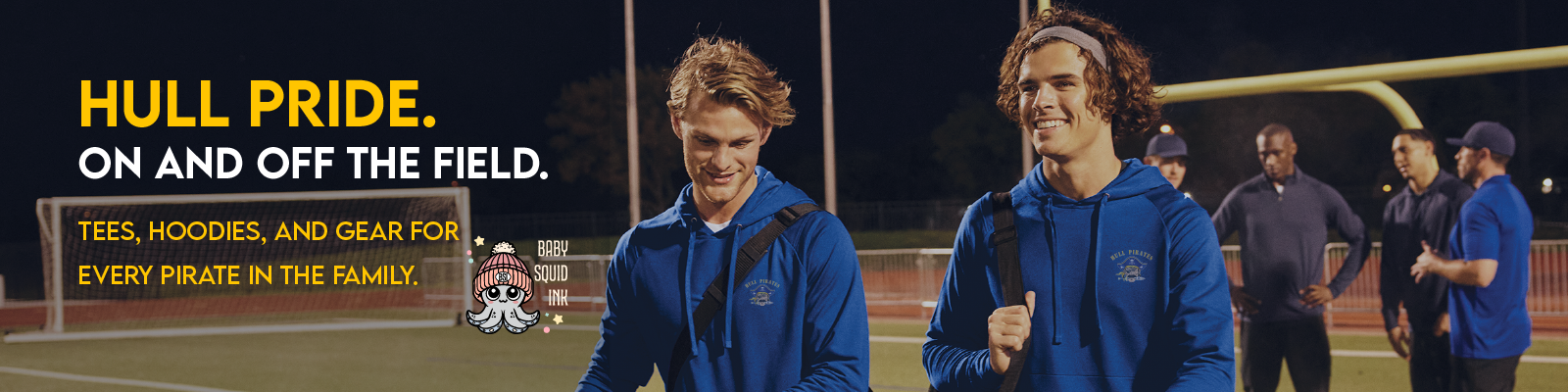 Two men in blue jackets on a sports field with promotional text about Hull Pride branding.