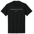 Black t-shirt with 'Humanity Is Not a Crime' text and dove graphic on a white background