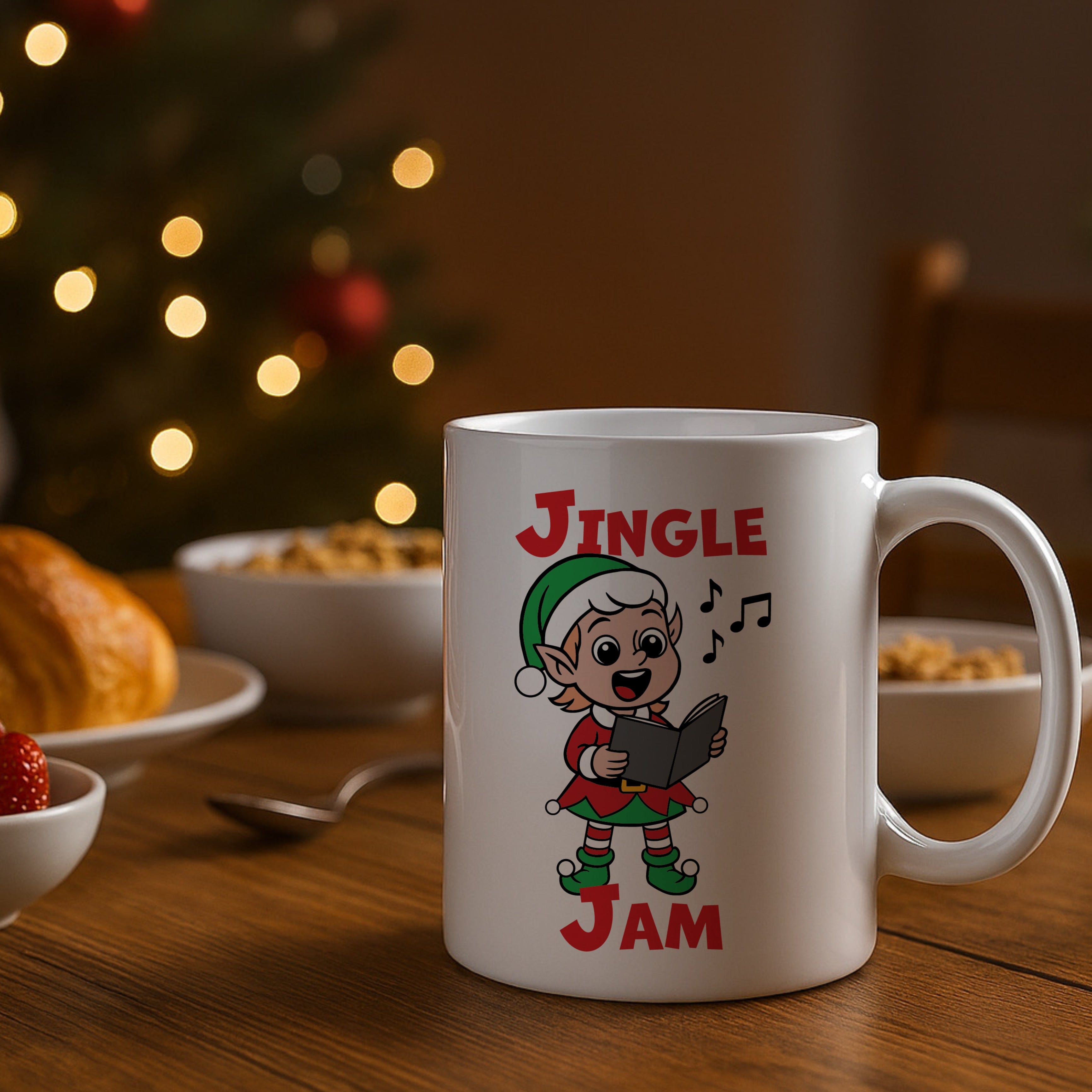 White mug with Christmas-themed design featuring an elf and text 'Jingle Jam' on a table with food and lights in the background.