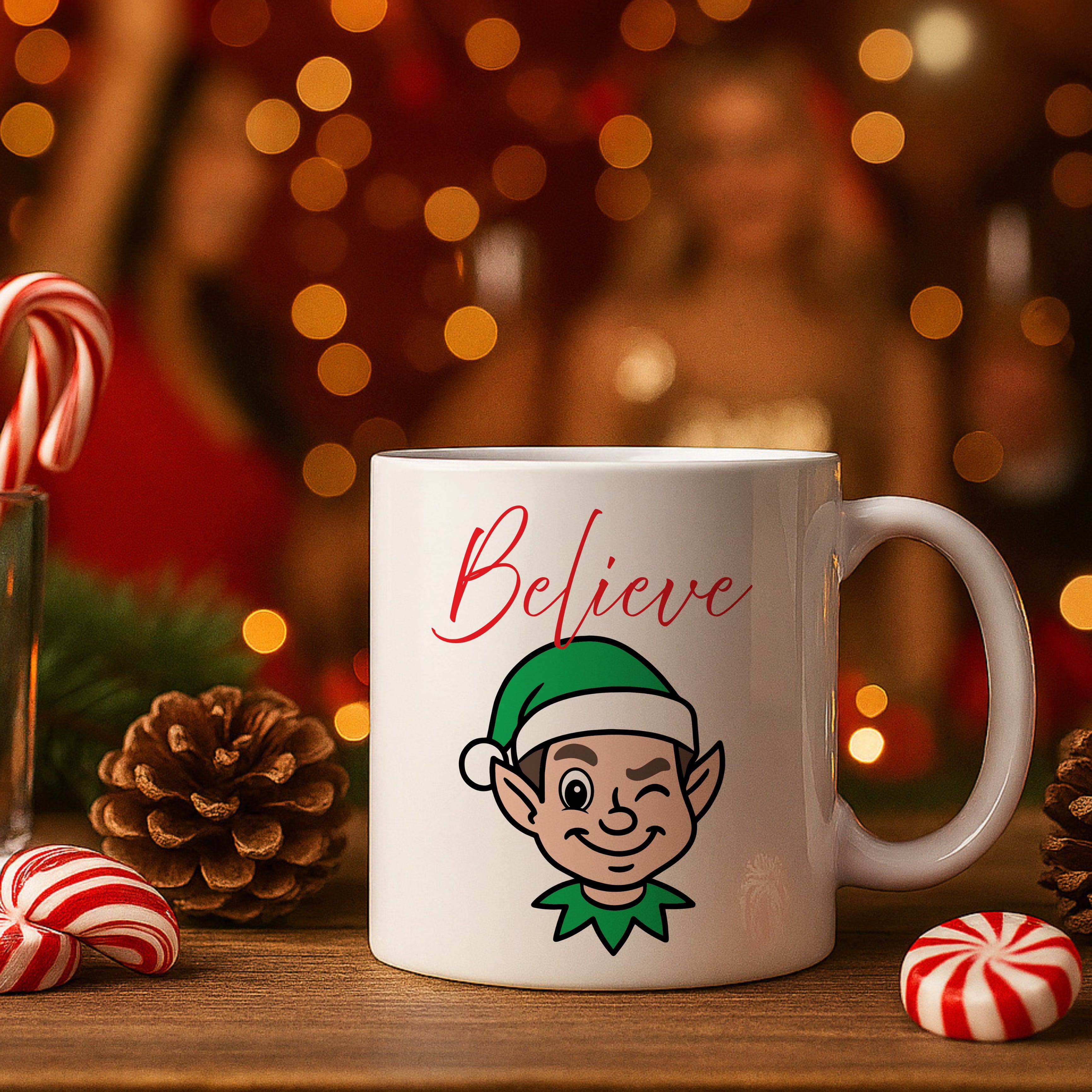 White mug with elf design and 'Believe' text on a festive background with candy canes and pine cones.